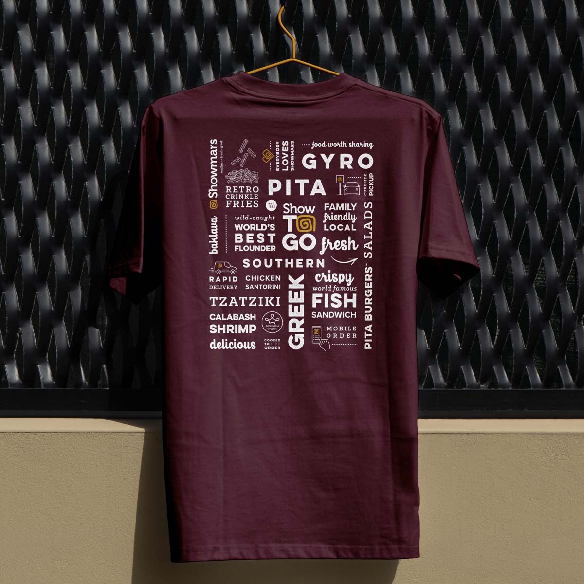 Showmars Menu tee - back print of fan-favorite dishes and classic Showmars taglines